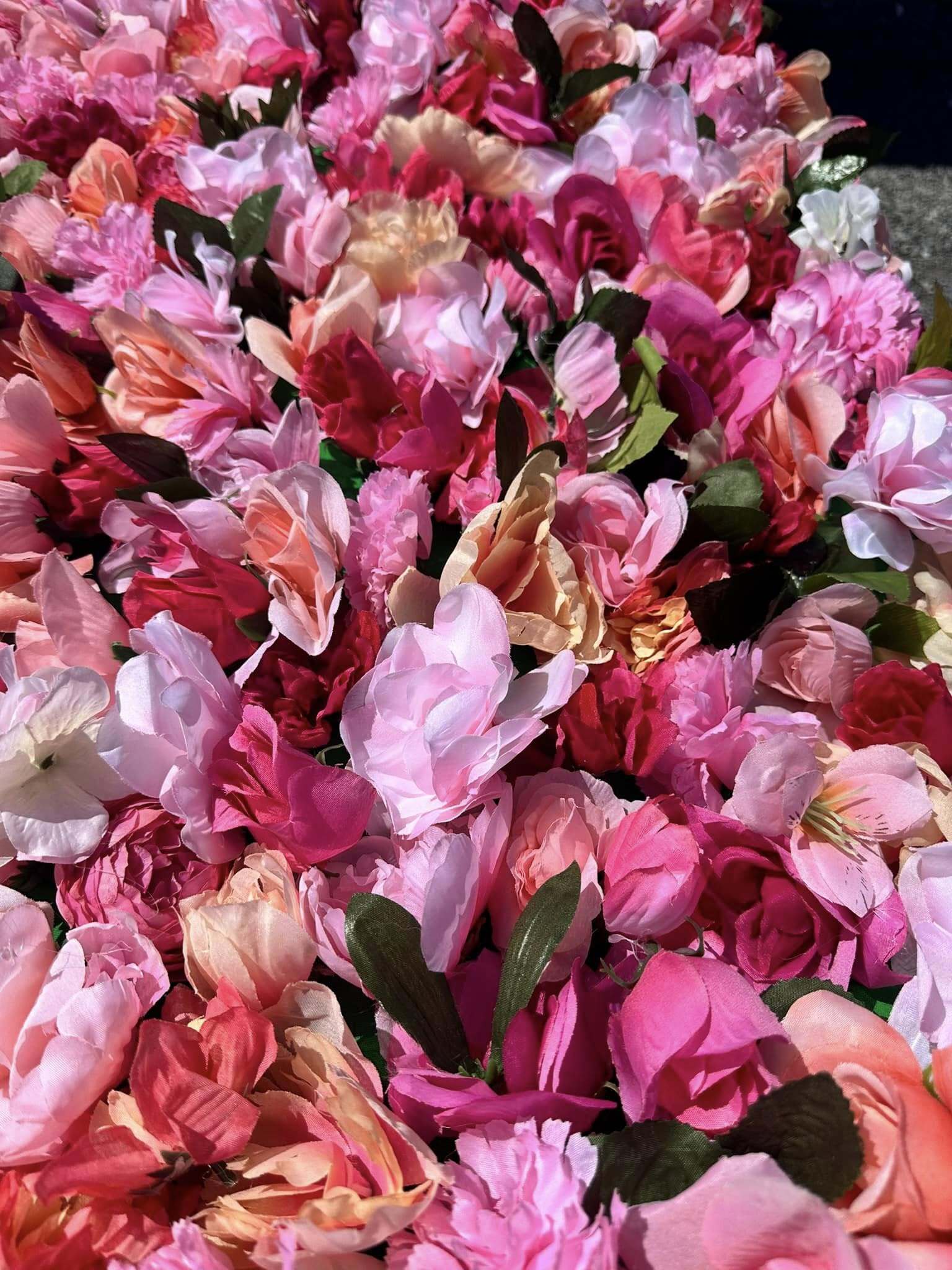 Pink orange floral wall something borrowed wedding and event rentals wv
